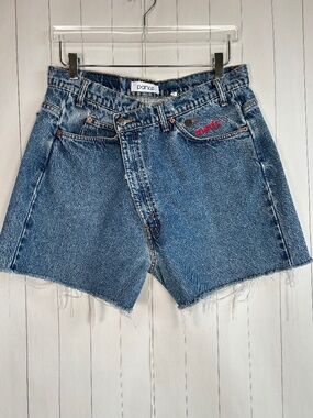 Parke size L denim jean shorts upcycled cross front blue medium wash raw hem